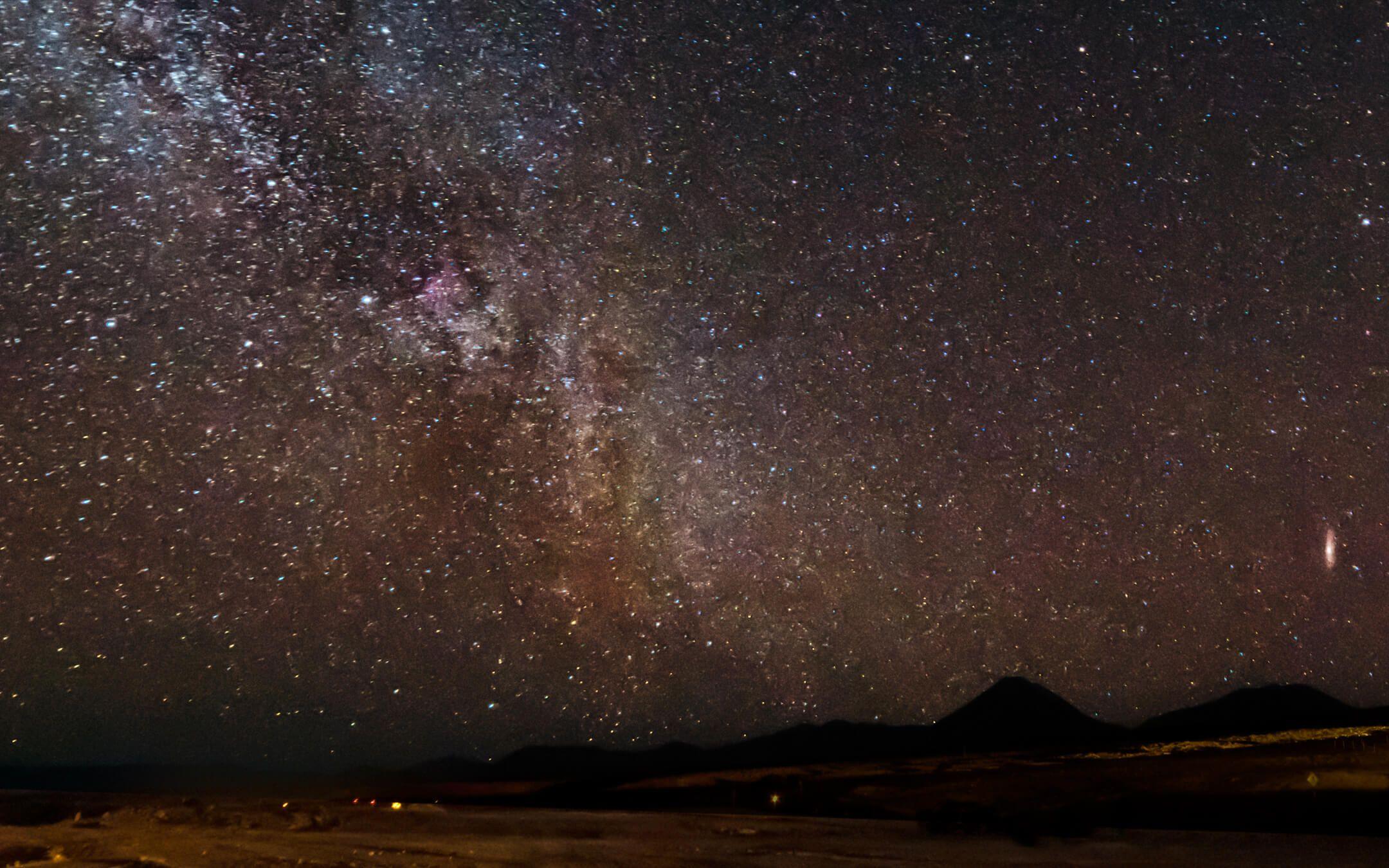 The Milky Way and Andromeda Galaxy over the volcano Licancabur taken from the ALMA radio telescope facility in the Atacama desert, Chile.
Photographer: Frank Turina