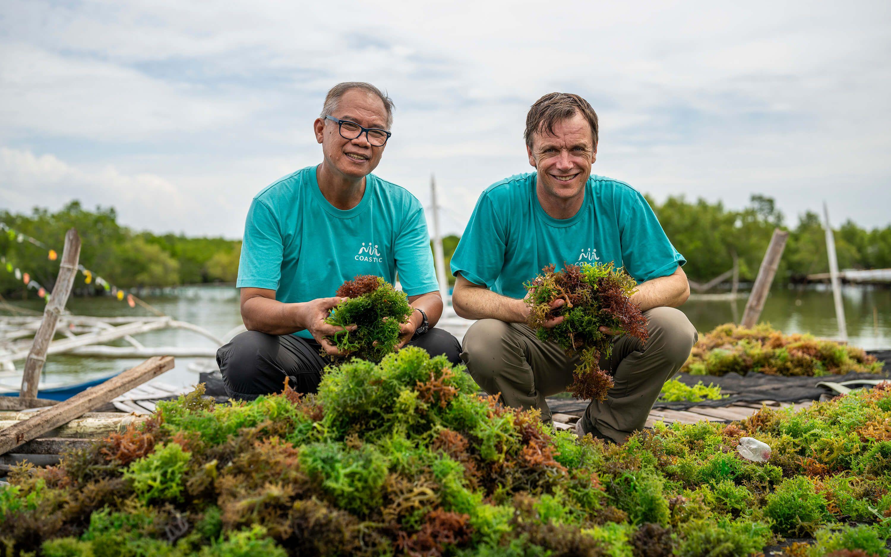 Co-founders Amado ‘Madz’ Blanco and Nick Hill hold armfuls of seaweed.
Photo: Coast 4C