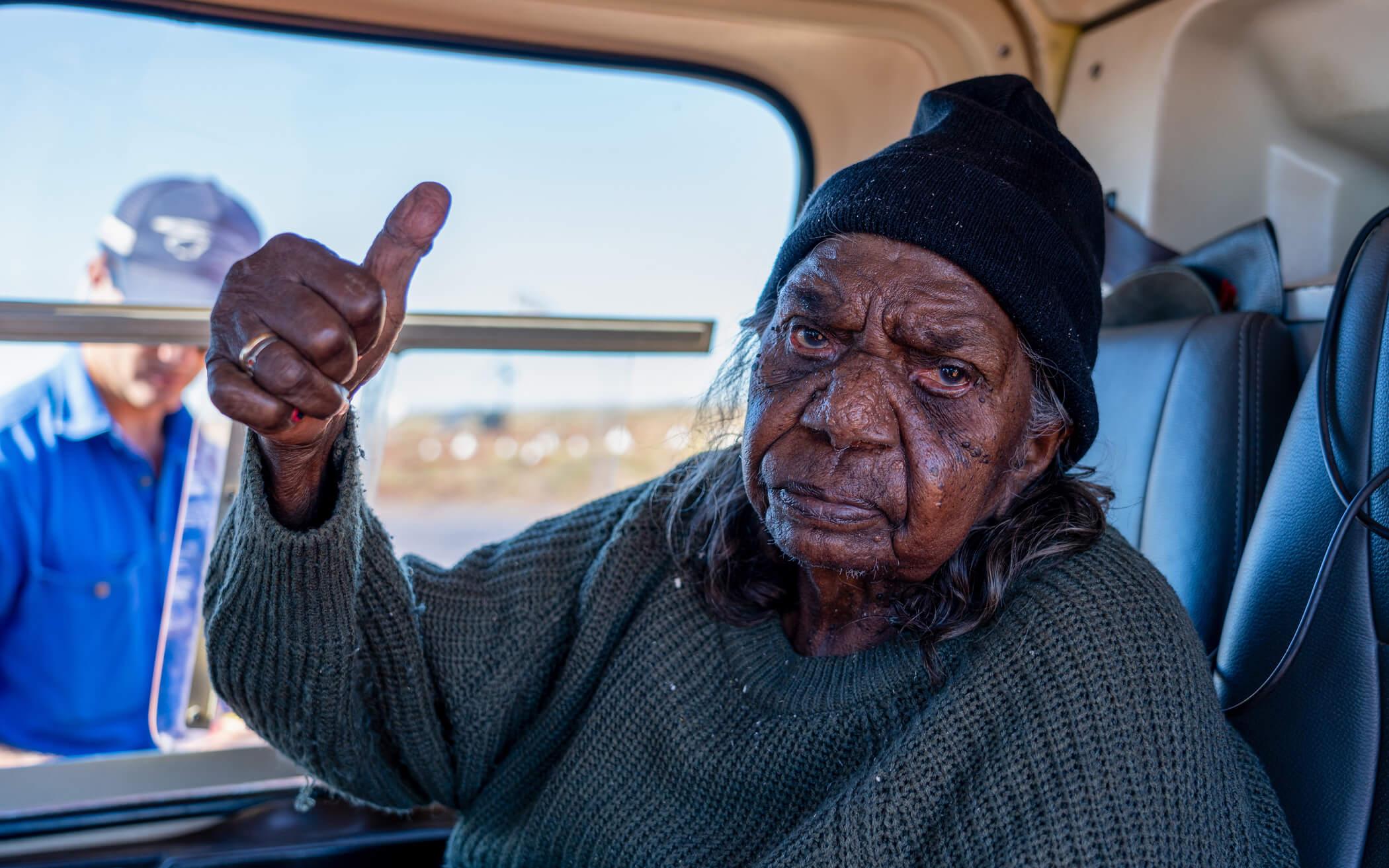 Pujiman (desert-born) Elder, Kumpaya Girgiba sits in the helicopter ready to direct the waterhole mapping flight through memory and traditional songs.
Photo: Kanyirninpa Jukurrpa