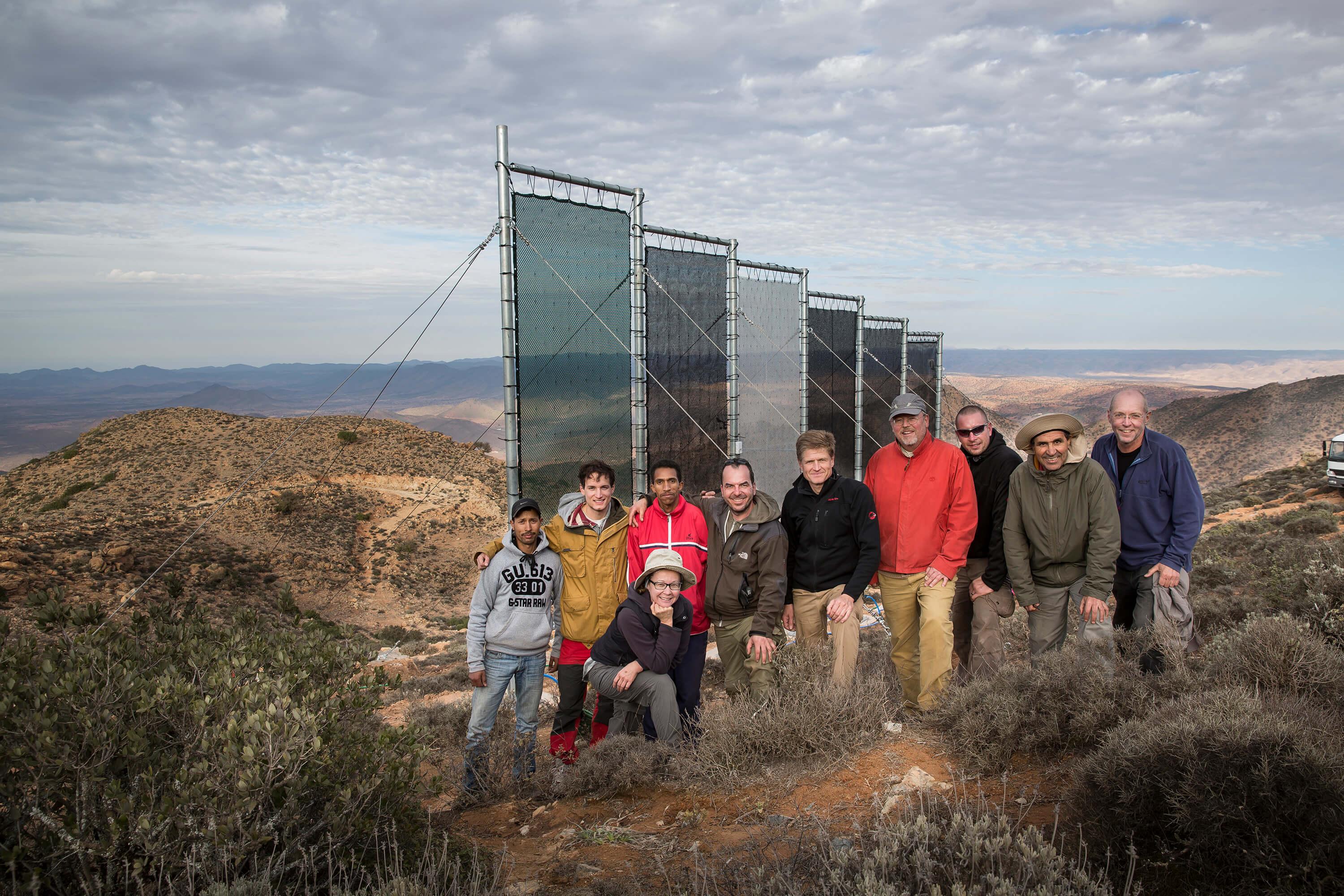The Dar Si Hamad in front of a fog net in the Anti-Atlas mountains. Dar Si Hmad is working to become a public utility in Morocco - a status that would enable better fundraising and create sustainable livelihoods.
Photo: Dar Si Hamad